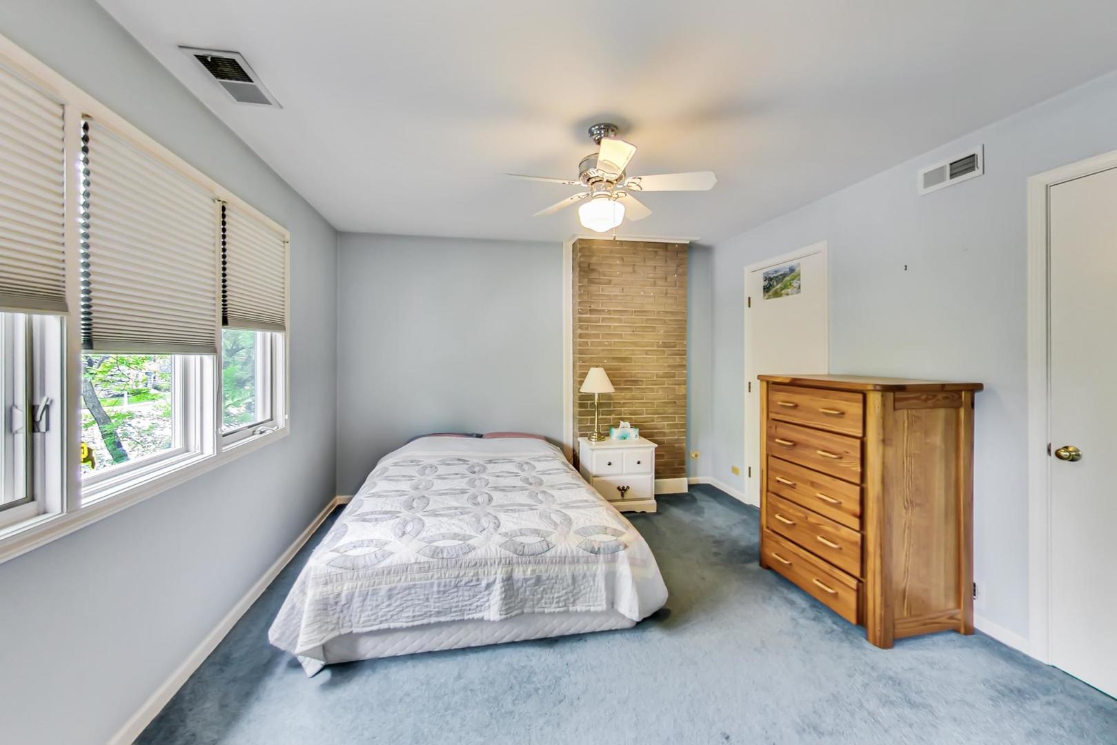 701 South Seminary Avenue Park Ridge, IL 60068 - Photo 34 of 60 a bedroom with a bed and a window