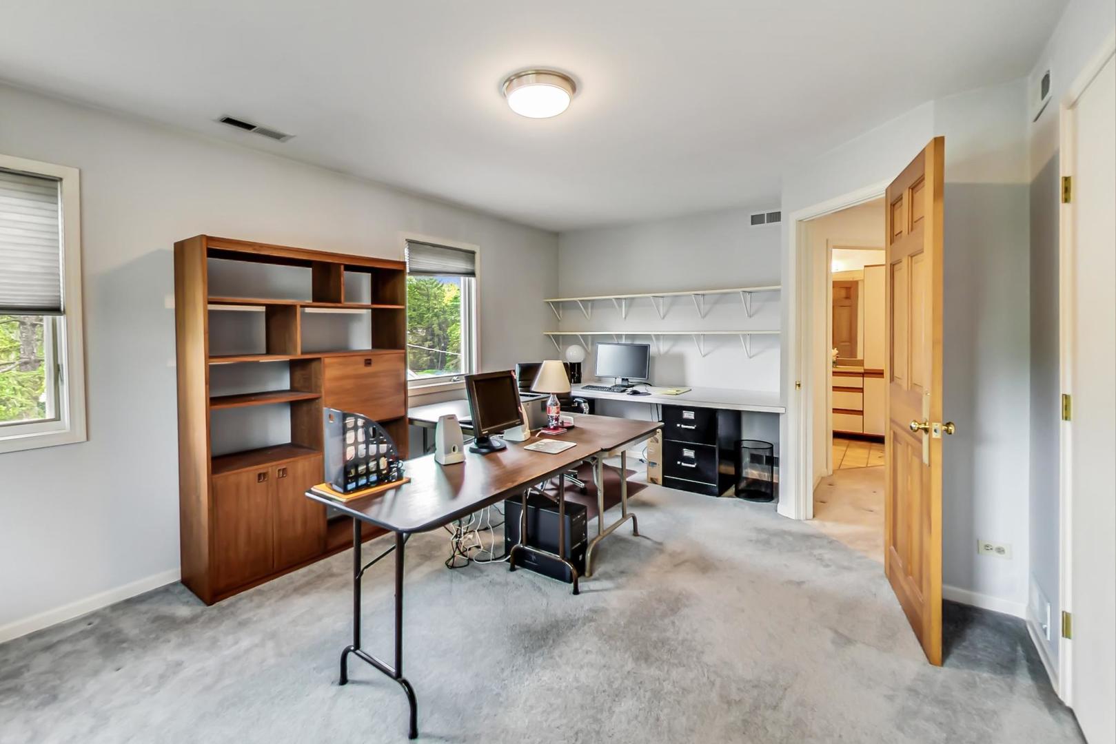 701 South Seminary Avenue Park Ridge, IL 60068 - Photo 37 of 60 a view of a workspace with furniture and a window