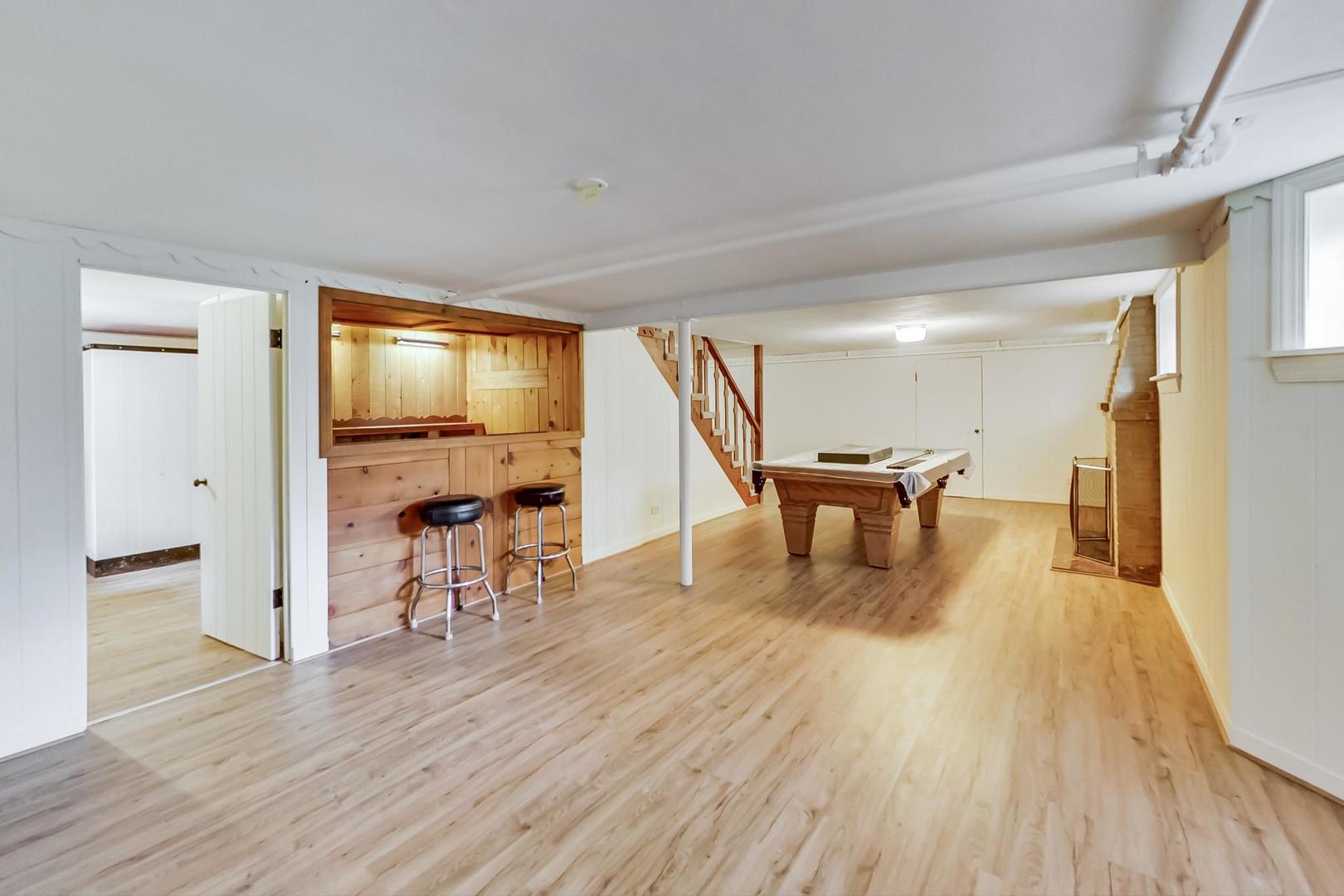 701 South Seminary Avenue Park Ridge, IL 60068 - Photo 40 of 60 a living room with furniture and a wooden floor