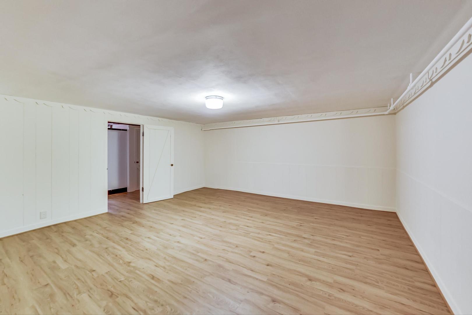 701 South Seminary Avenue Park Ridge, IL 60068 - Photo 42 of 60 a view of empty room with wooden floor