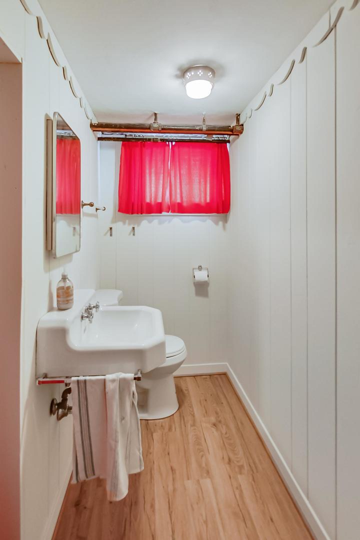 701 South Seminary Avenue Park Ridge, IL 60068 - Photo 45 of 60 a bathroom with a sink vanity and mirror