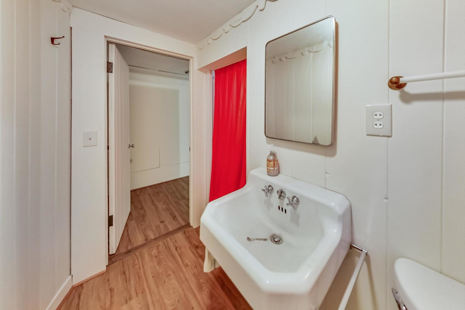 701 South Seminary Avenue Park Ridge, IL 60068 - Photo 46 of 60 a bathroom with a sink and a mirror