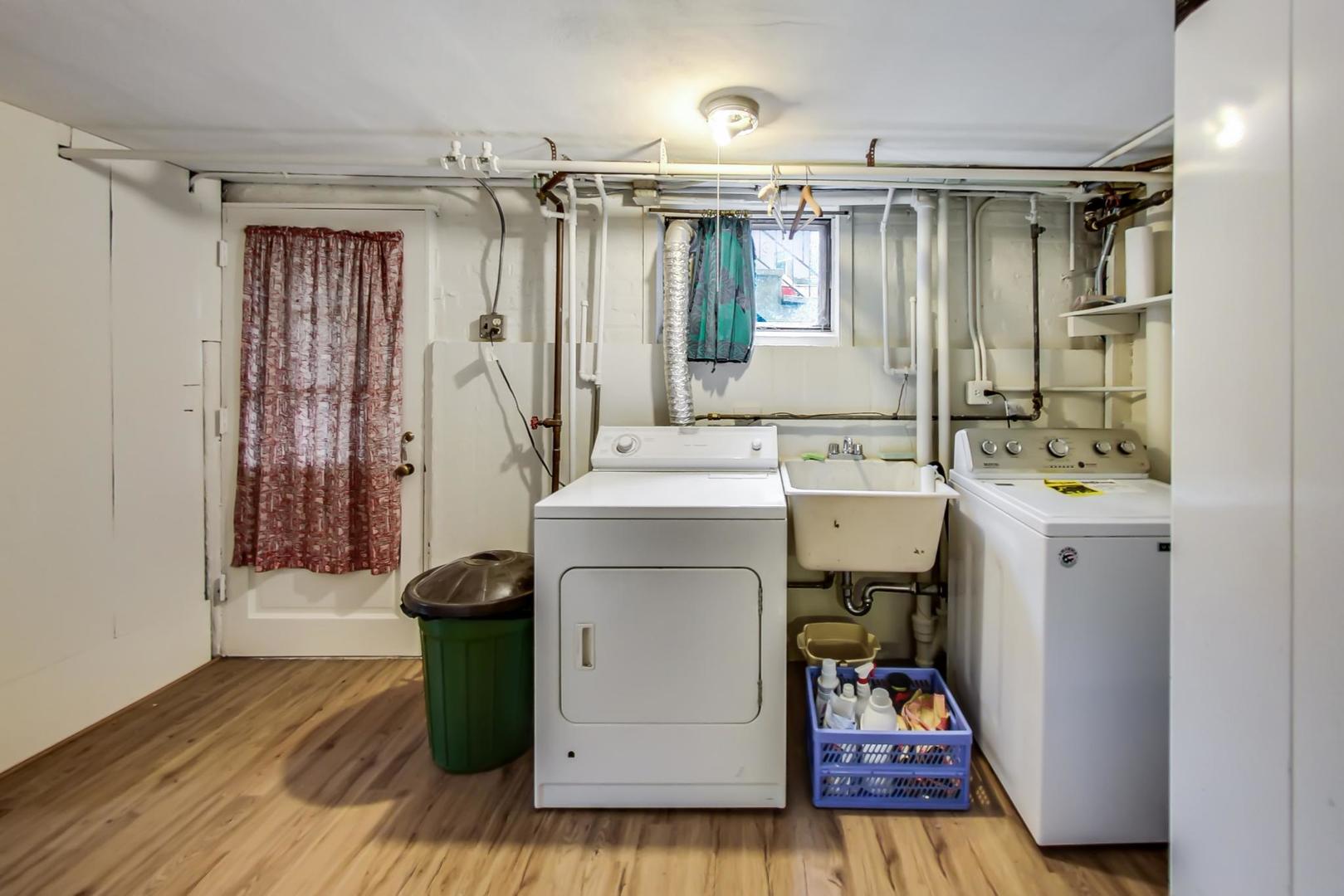 701 South Seminary Avenue Park Ridge, IL 60068 - Photo 47 of 60 a utility room with cabinets washer and dryer