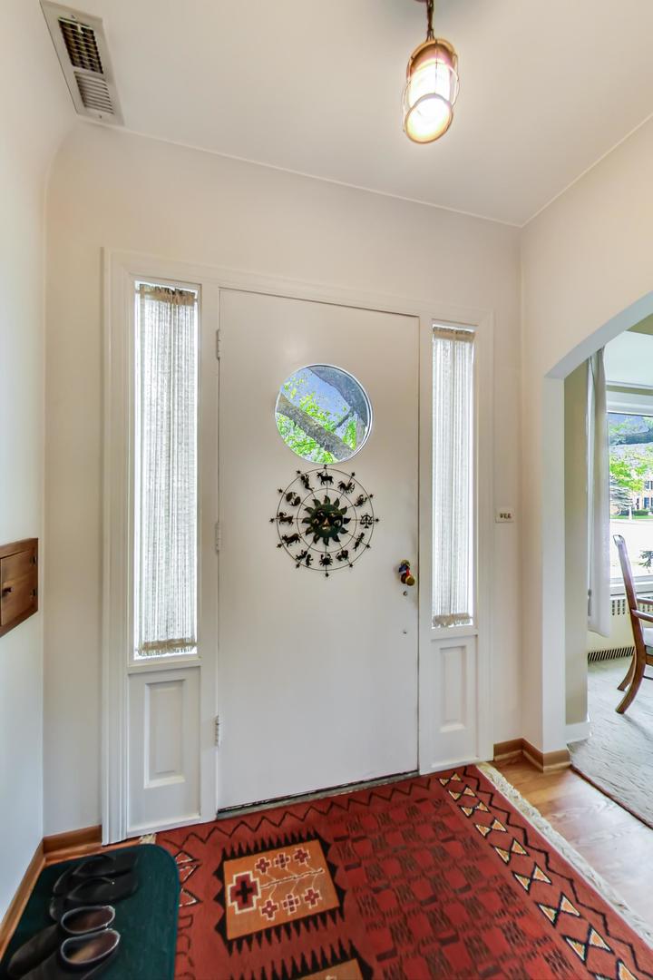 701 South Seminary Avenue Park Ridge, IL 60068 - Photo 6 of 60 a bedroom with a bed and a window