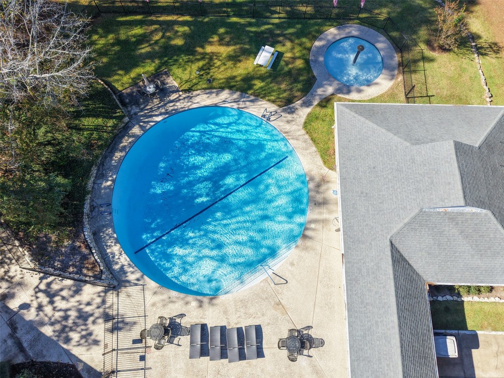 110 Lords Circle Coldspring, TX 77331 - Photo 34 of 34 a view of a swimming pool with outdoor seating and plants