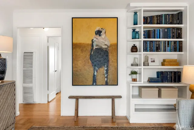 a view of living room with furniture and rug