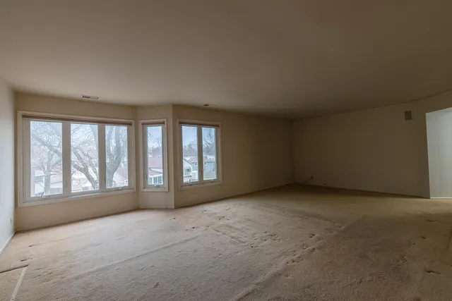 an empty room with windows