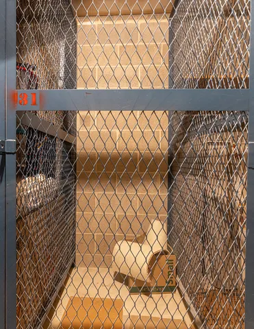 a view of parking garage with cars