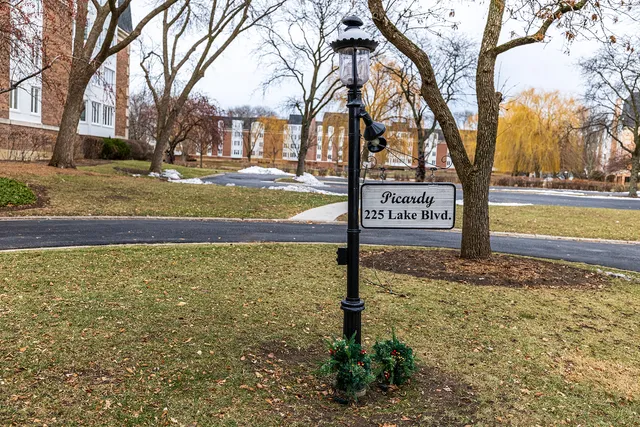 a view of a street with a building in the background