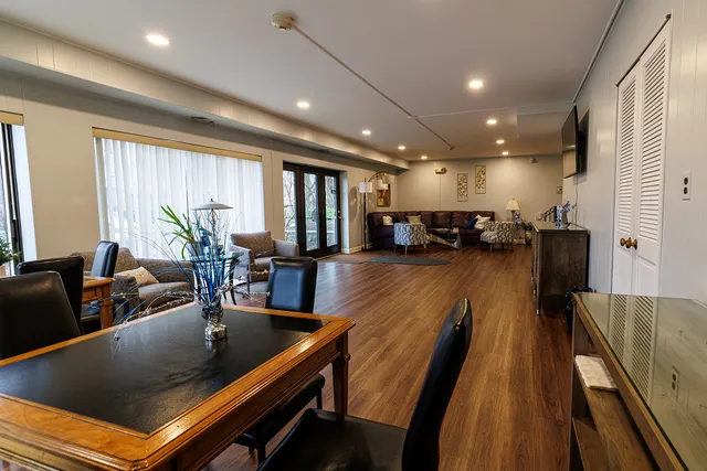 a view of kitchen dining table and chairs