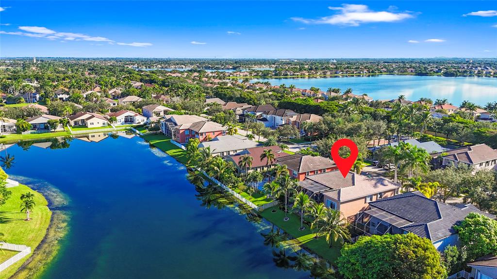 4622 Southwest 185th Avenue Miramar, FL 33029 - Photo 2 of 64 an aerial view of residential houses with outdoor space and river