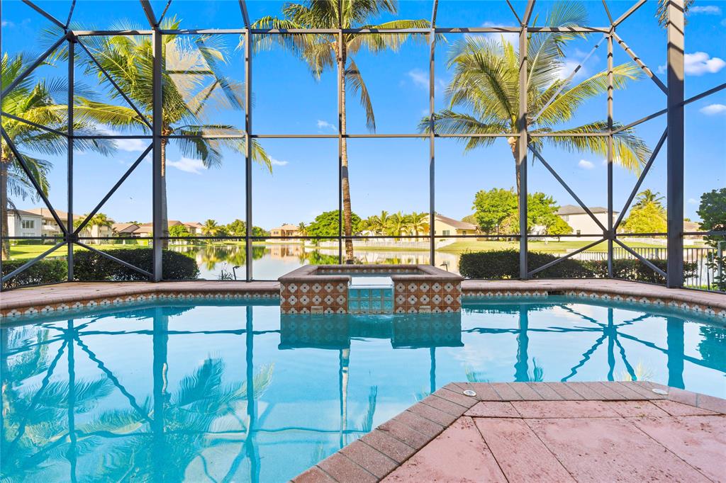 4622 Southwest 185th Avenue Miramar, FL 33029 - Photo 6 of 64 a view of a chairs and table in the terrace