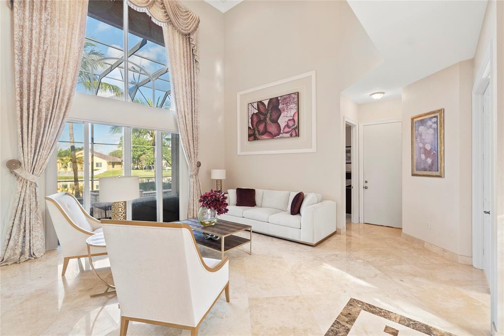 4622 Southwest 185th Avenue Miramar, FL 33029 - Photo 10 of 64 a living room with furniture and a large window