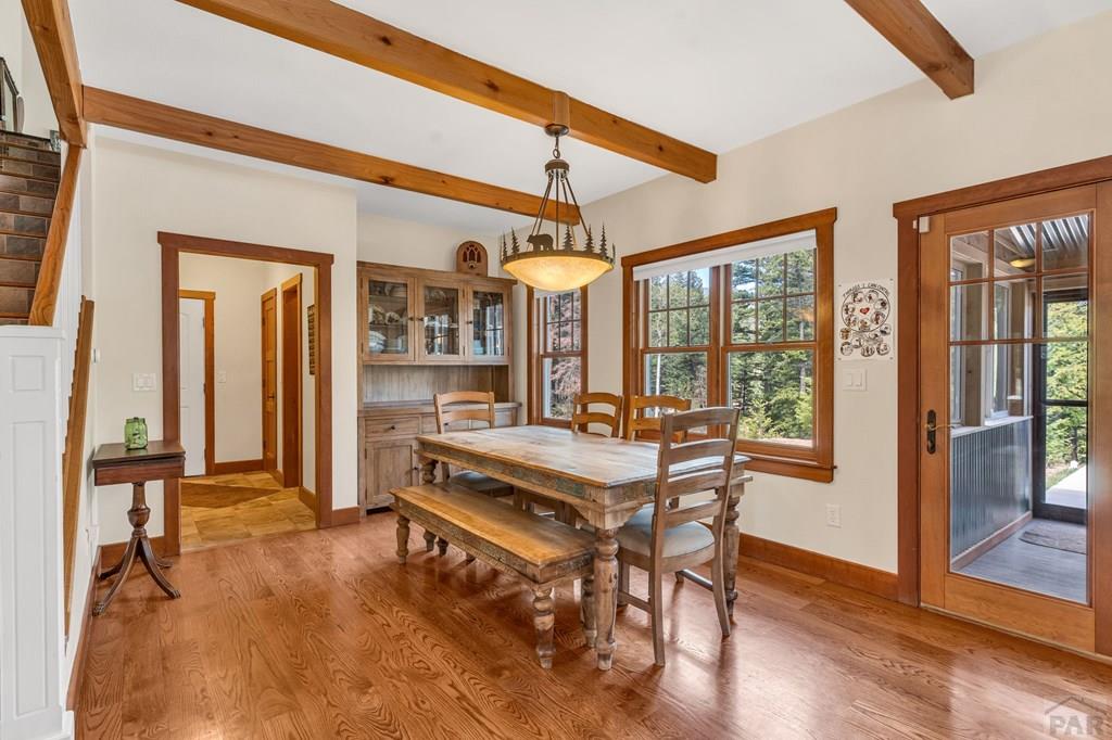 10 Robert Road Rye, CO 81069 - Photo 26 of 102 a view of a dining room with furniture window and wooden floor
