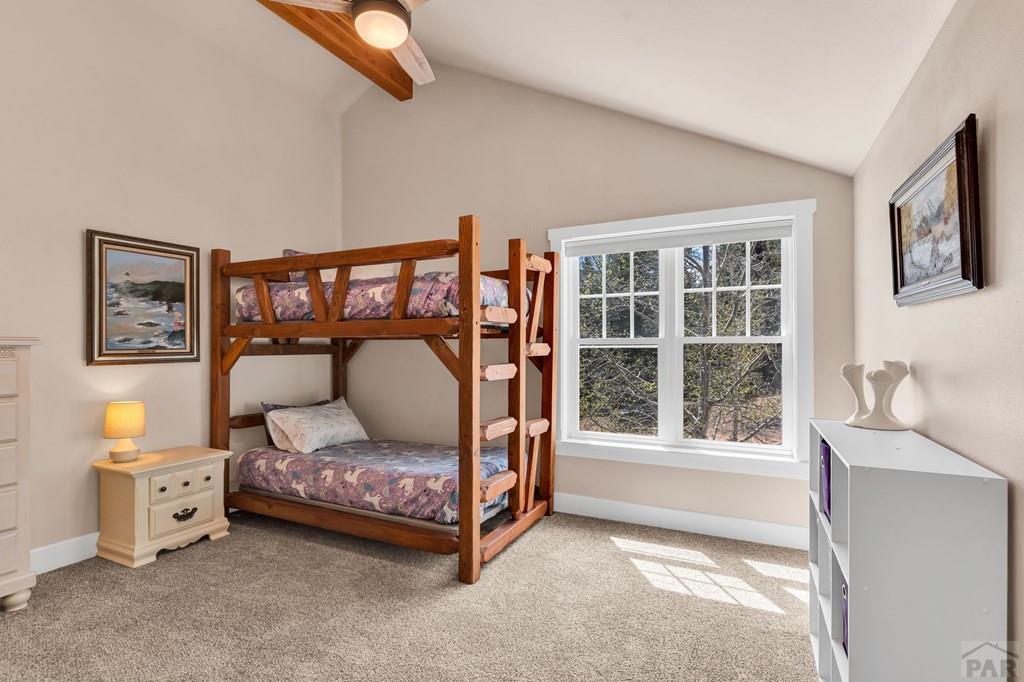 10 Robert Road Rye, CO 81069 - Photo 37 of 102 a bedroom with furniture and a large window