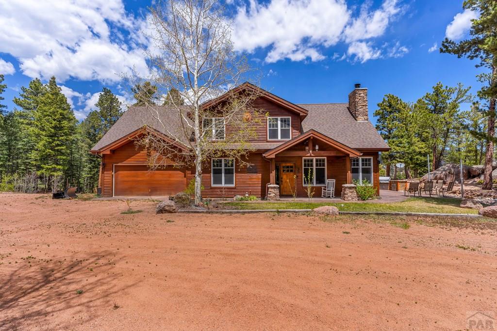 10 Robert Road Rye, CO 81069 - Photo 4 of 102 a front view of a house with a yard