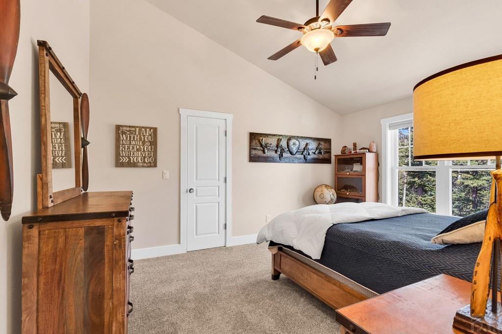 10 Robert Road Rye, CO 81069 - Photo 43 of 102 a bedroom with a bed dresser and a window