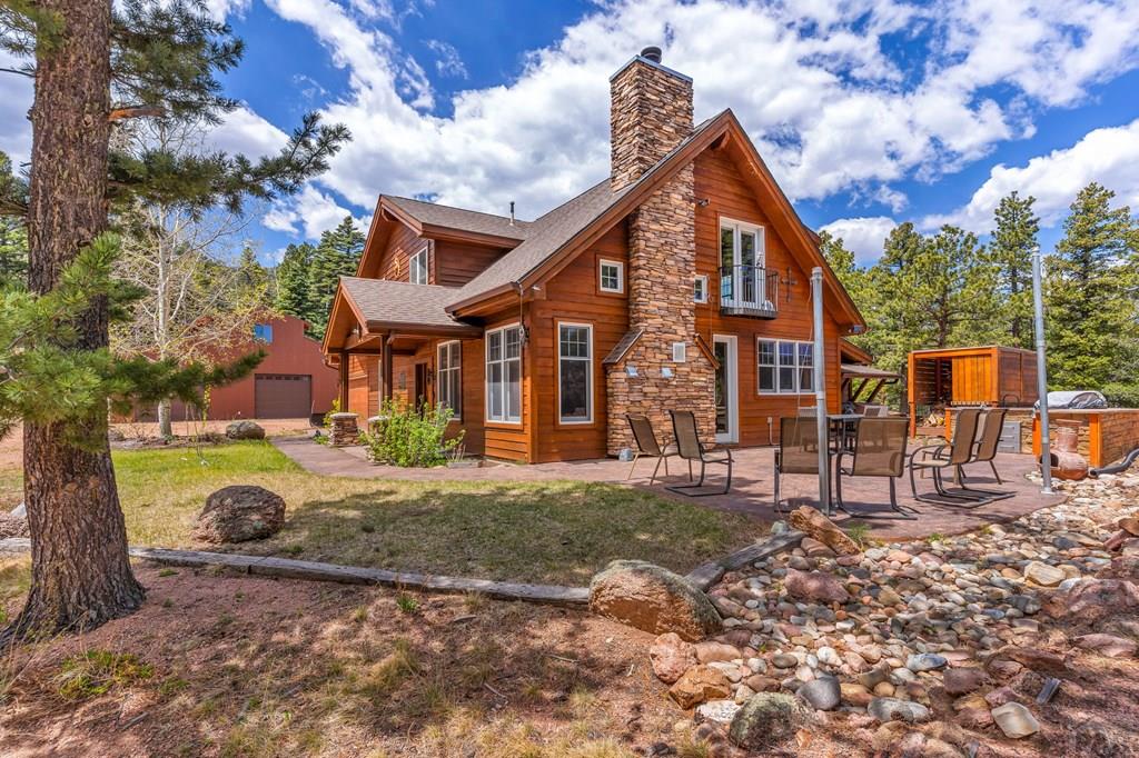 10 Robert Road Rye, CO 81069 - Photo 5 of 102 a front view of a house with a yard