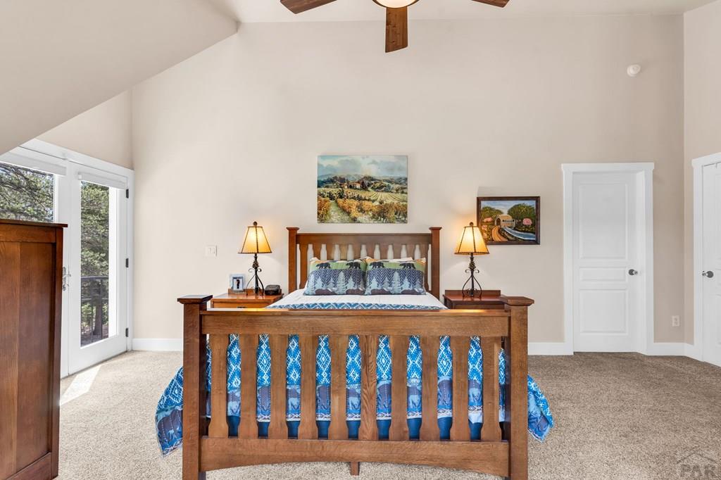 10 Robert Road Rye, CO 81069 - Photo 51 of 102 a bedroom with furniture and a baby crib