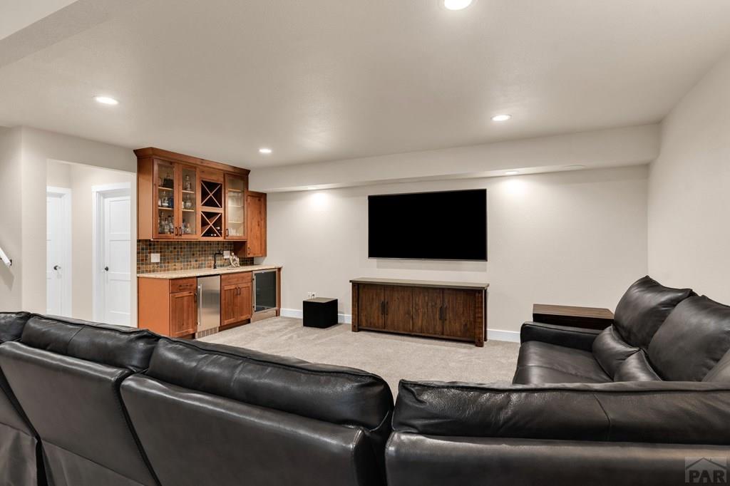 10 Robert Road Rye, CO 81069 - Photo 59 of 102 a living room with furniture and a flat screen tv