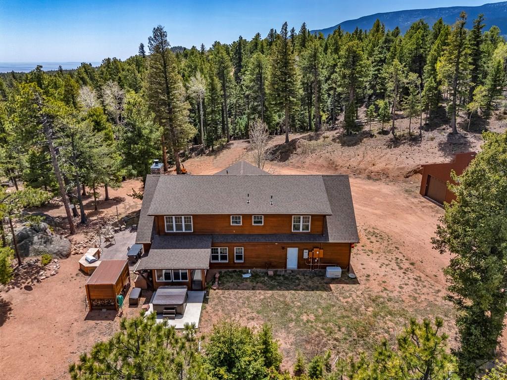 10 Robert Road Rye, CO 81069 - Photo 82 of 102 an aerial view of a house with trees all around