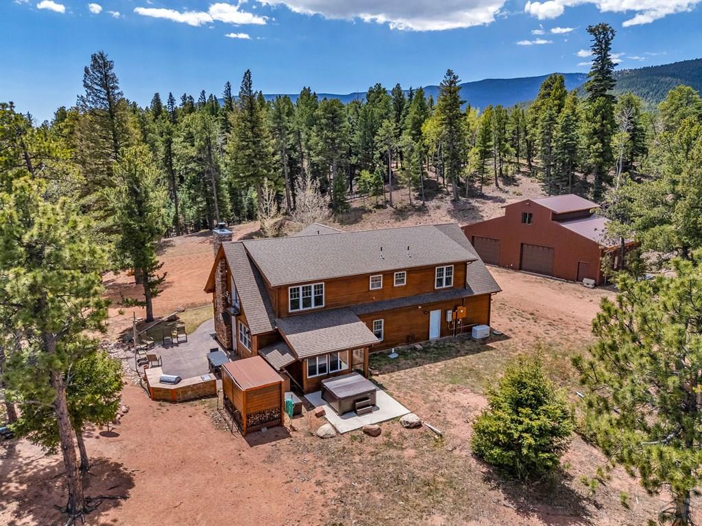 10 Robert Road Rye, CO 81069 - Photo 83 of 102 an aerial view of a house with yard and outdoor seating