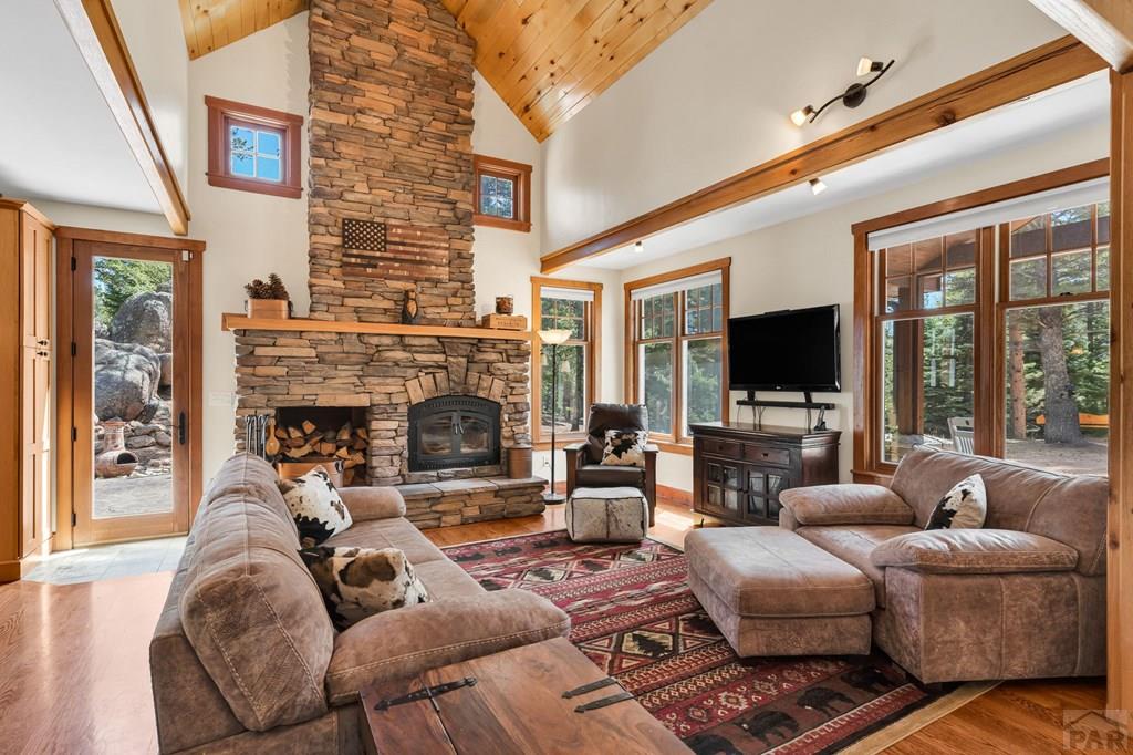 10 Robert Road Rye, CO 81069 - Photo 9 of 102 a living room with furniture fireplace and a flat screen tv