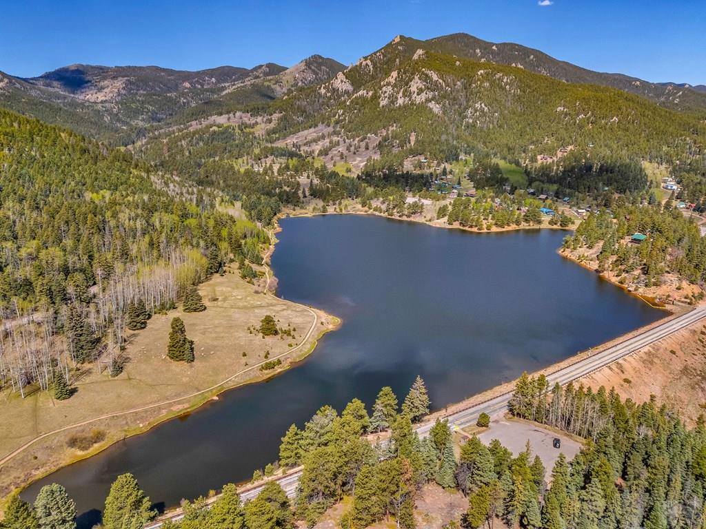 10 Robert Road Rye, CO 81069 - Photo 97 of 102 a view of a lake with a mountain in the background