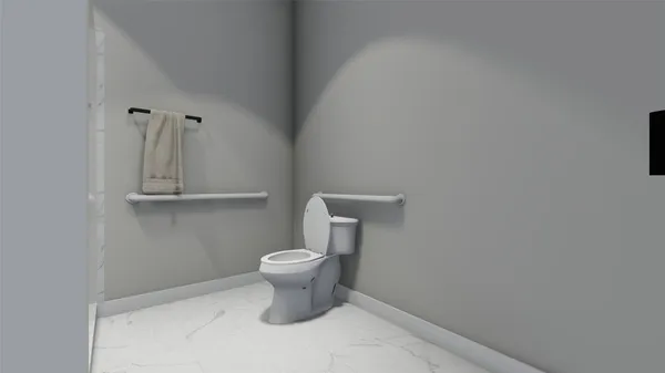 a white toilet sitting next to a bathroom sink