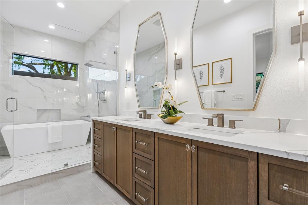 4311 Merrell Road Dallas, TX 75229 - Photo 7 of 30 a bathroom with a double vanity sink mirror and bathtub