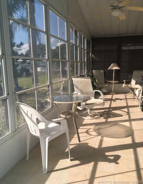 16152 Southwest Five Wood Way Indiantown, FL 34956 - Photo 4 of 9 a work room with glass windows