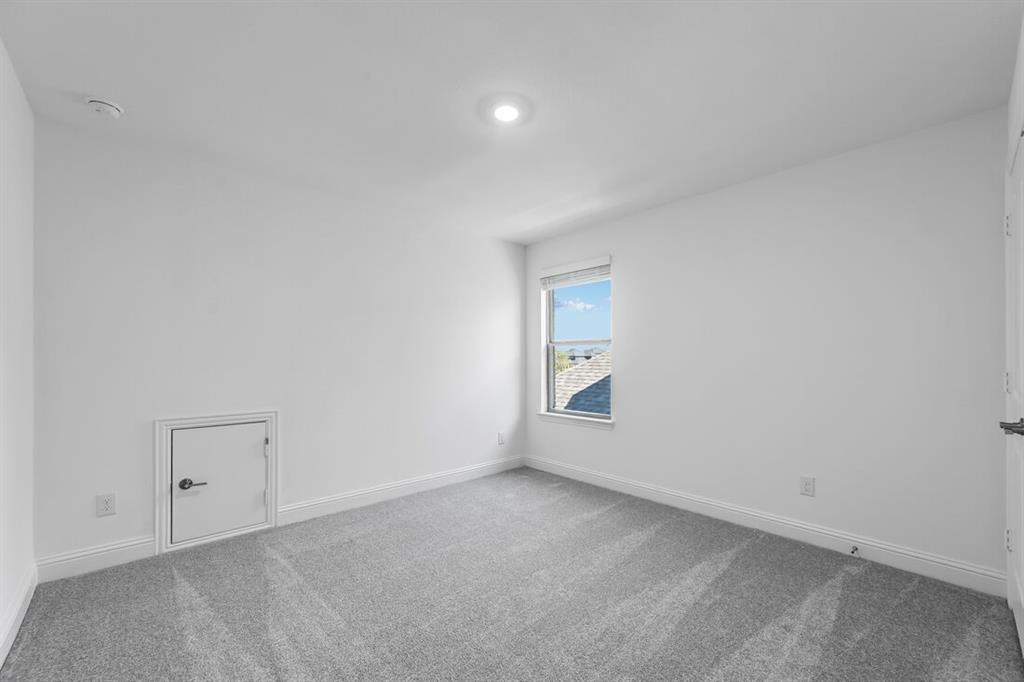 614 Bull Street Oak Point, TX 75068 - Photo 18 of 36 an empty room with a window