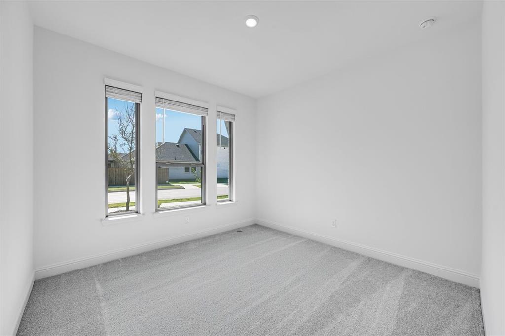 614 Bull Street Oak Point, TX 75068 - Photo 26 of 36 an empty room with a window