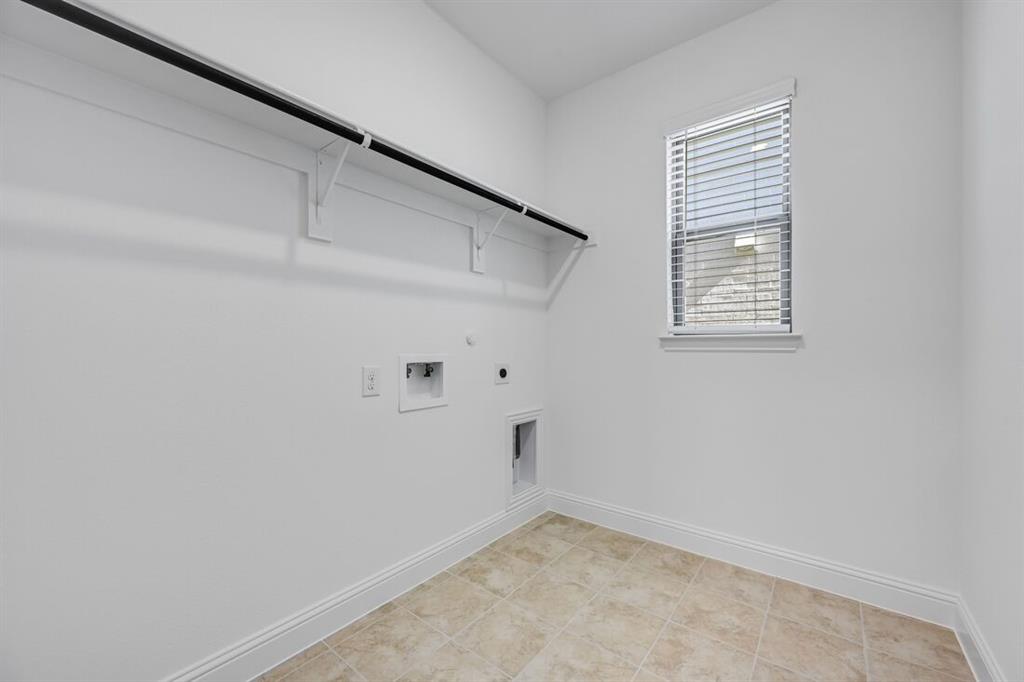 614 Bull Street Oak Point, TX 75068 - Photo 28 of 36 a view of an empty room with a window