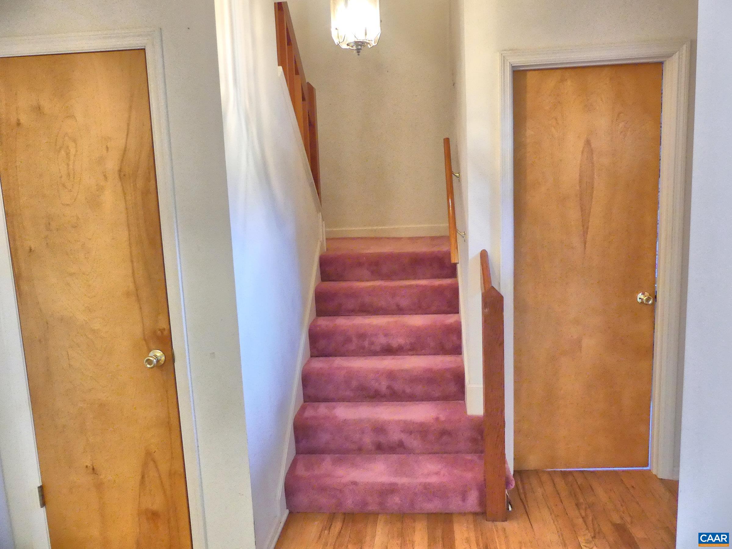 2 Marina Point Palmyra, VA 22963 - Photo 18 of 32 a view of staircase with wooden floor and a window