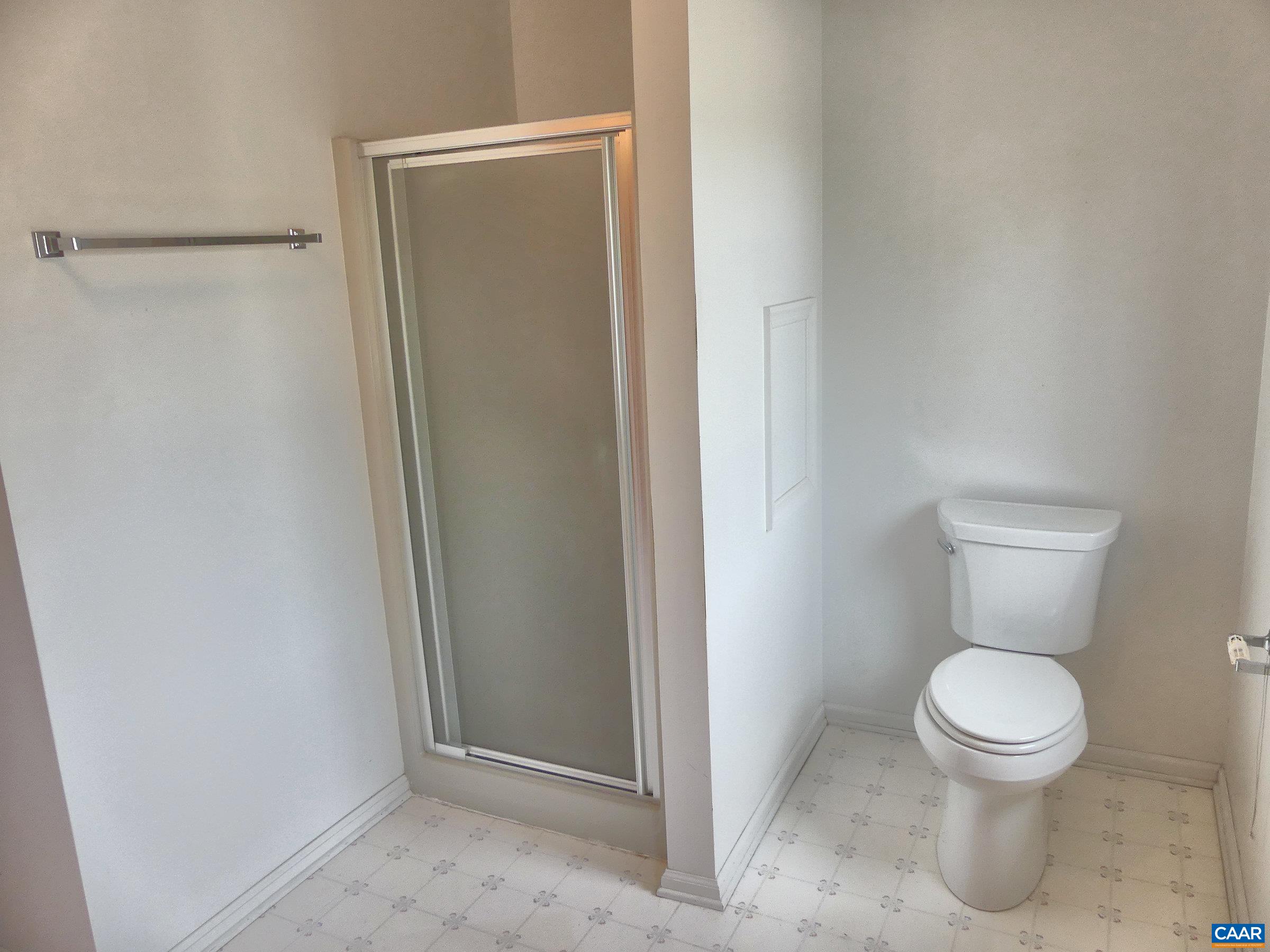 2 Marina Point Palmyra, VA 22963 - Photo 21 of 32 a white toilet sitting next to a shower