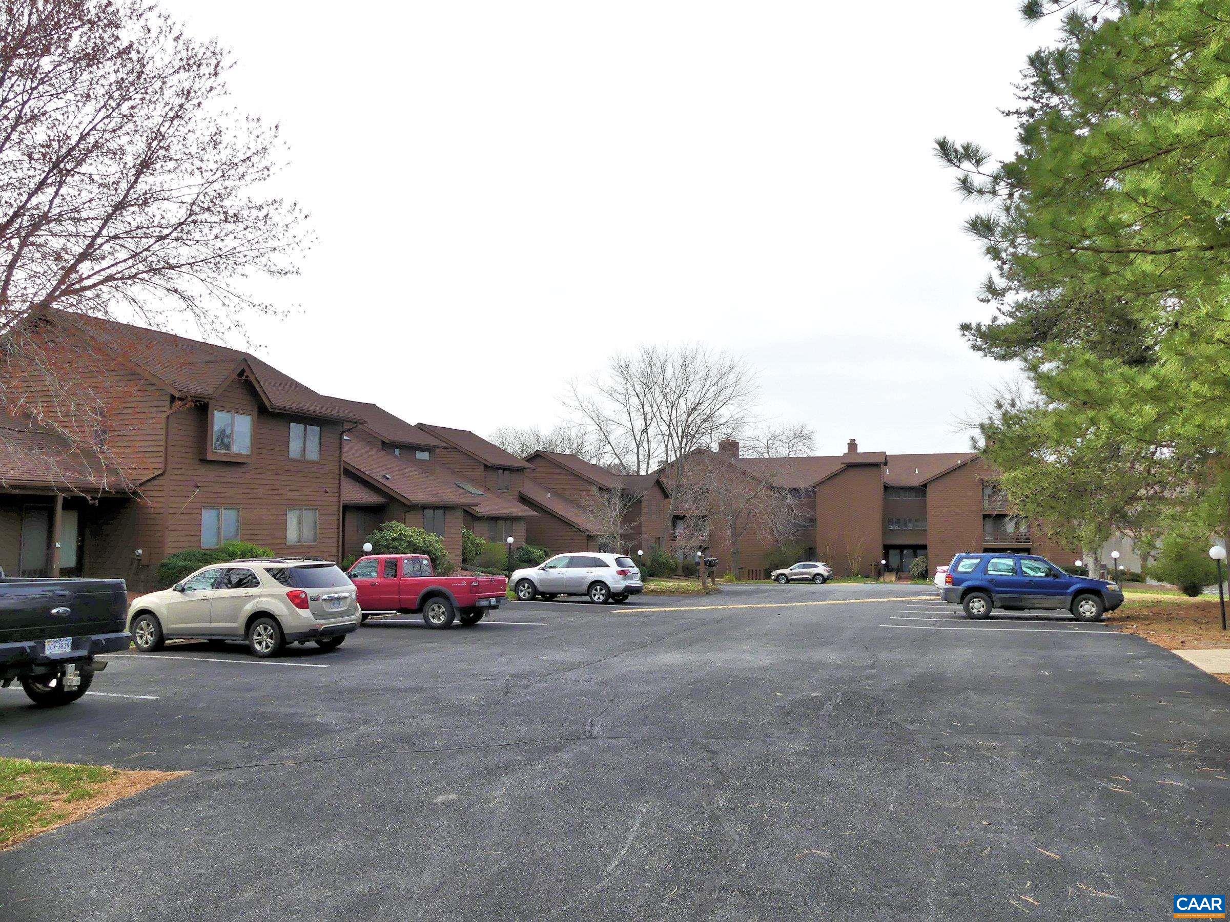 2 Marina Point Palmyra, VA 22963 - Photo 31 of 32 a view of road with card parked on side and retail shops