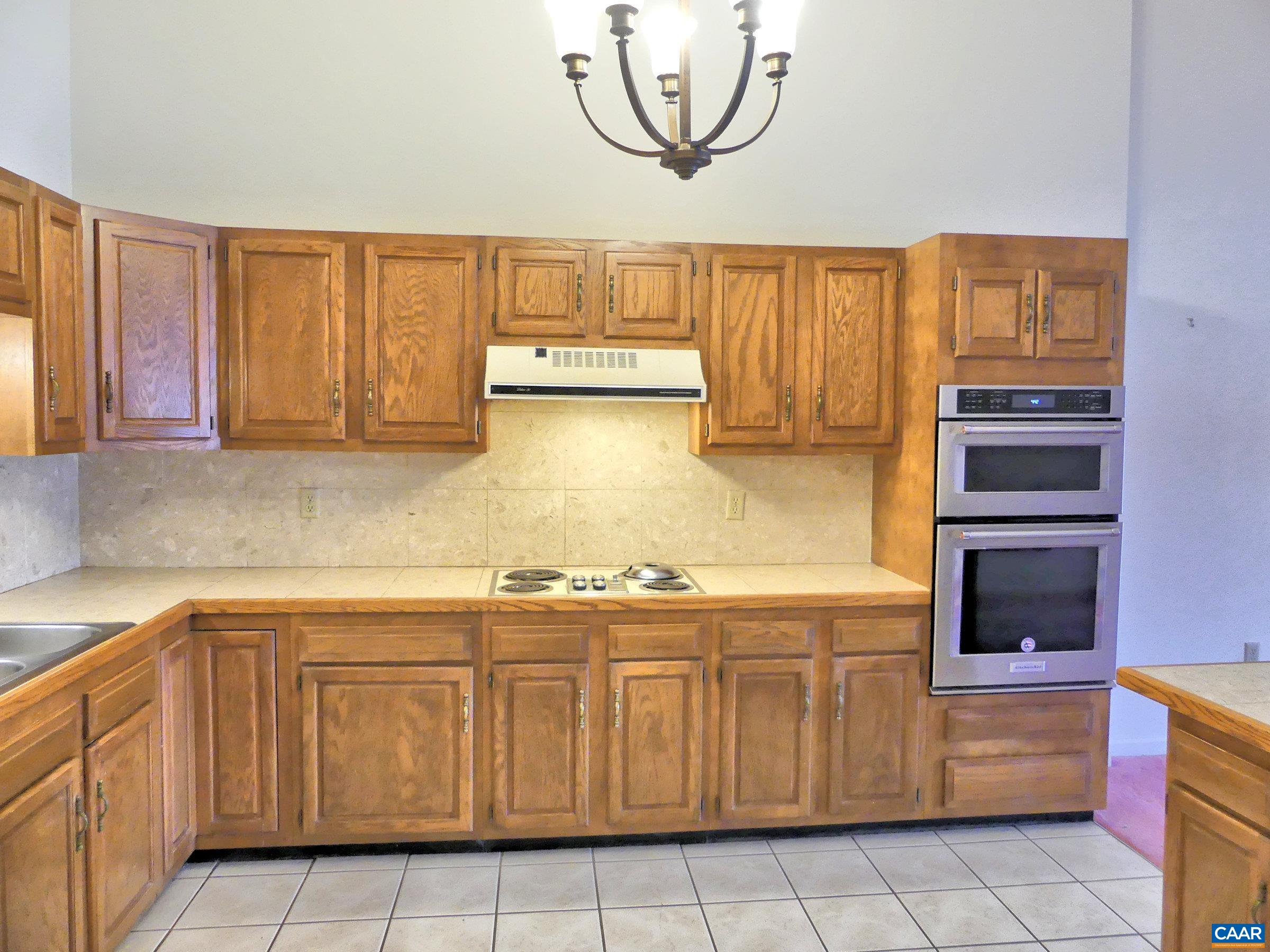 2 Marina Point Palmyra, VA 22963 - Photo 8 of 32 a kitchen with a cabinets and window