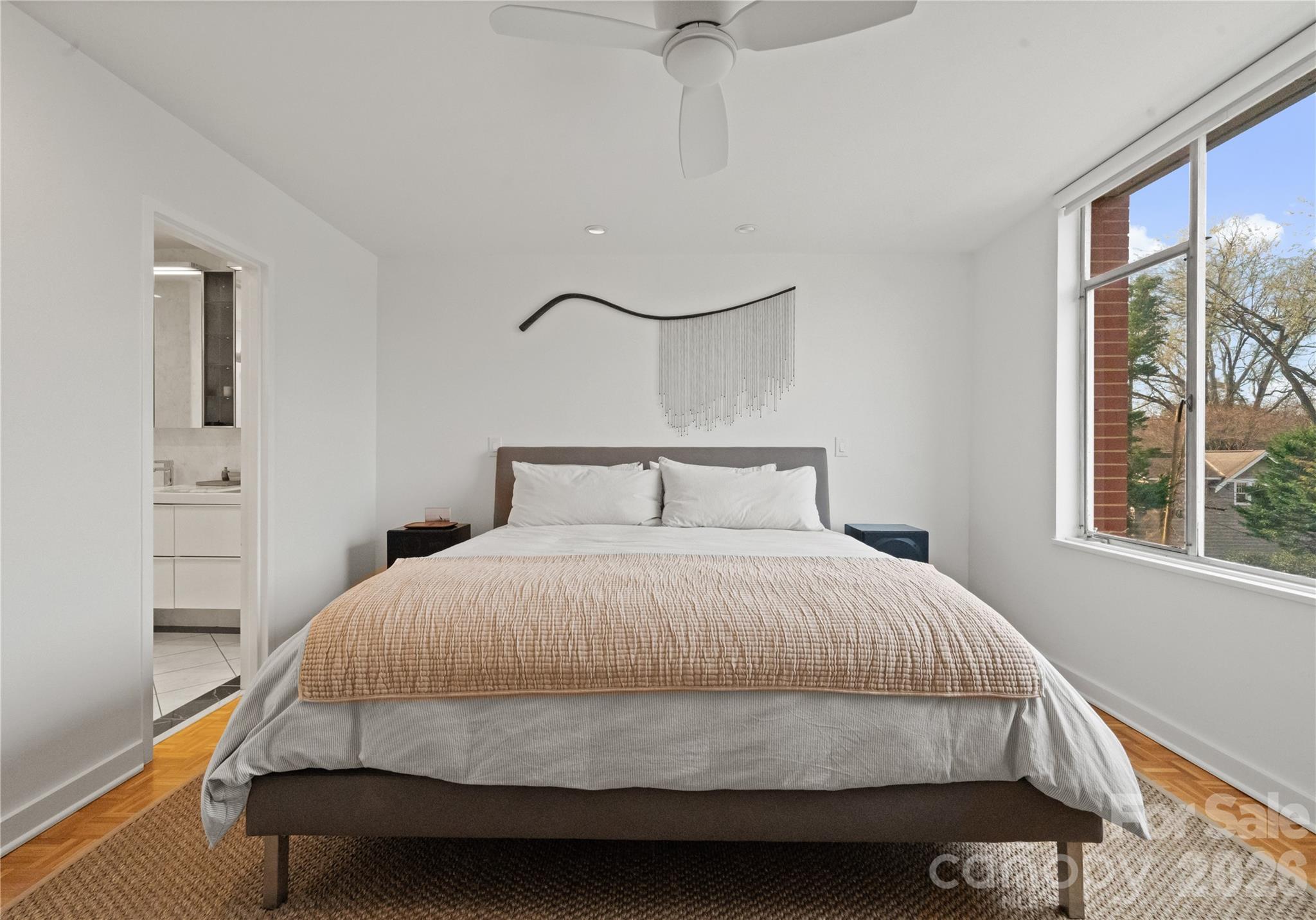 1300 Queens Road Charlotte, NC 28207 - Photo 23 of 45 a bedroom with a bed and window