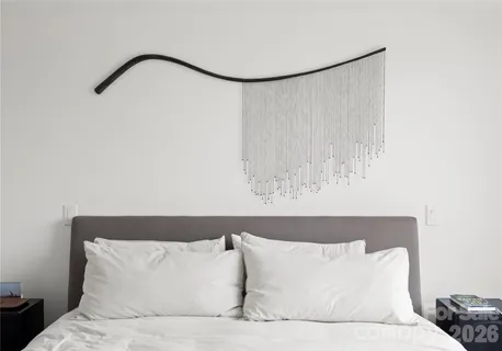 a bathroom with a double vanity sink toilet and shower