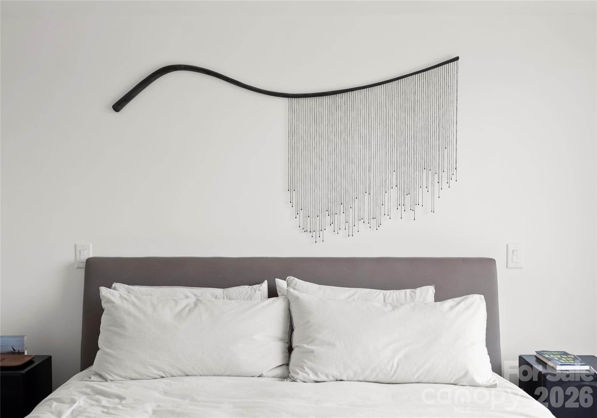 1300 Queens Road Charlotte, NC 28207 - Photo 25 of 45 a bedroom with a bed and a painting on the wall