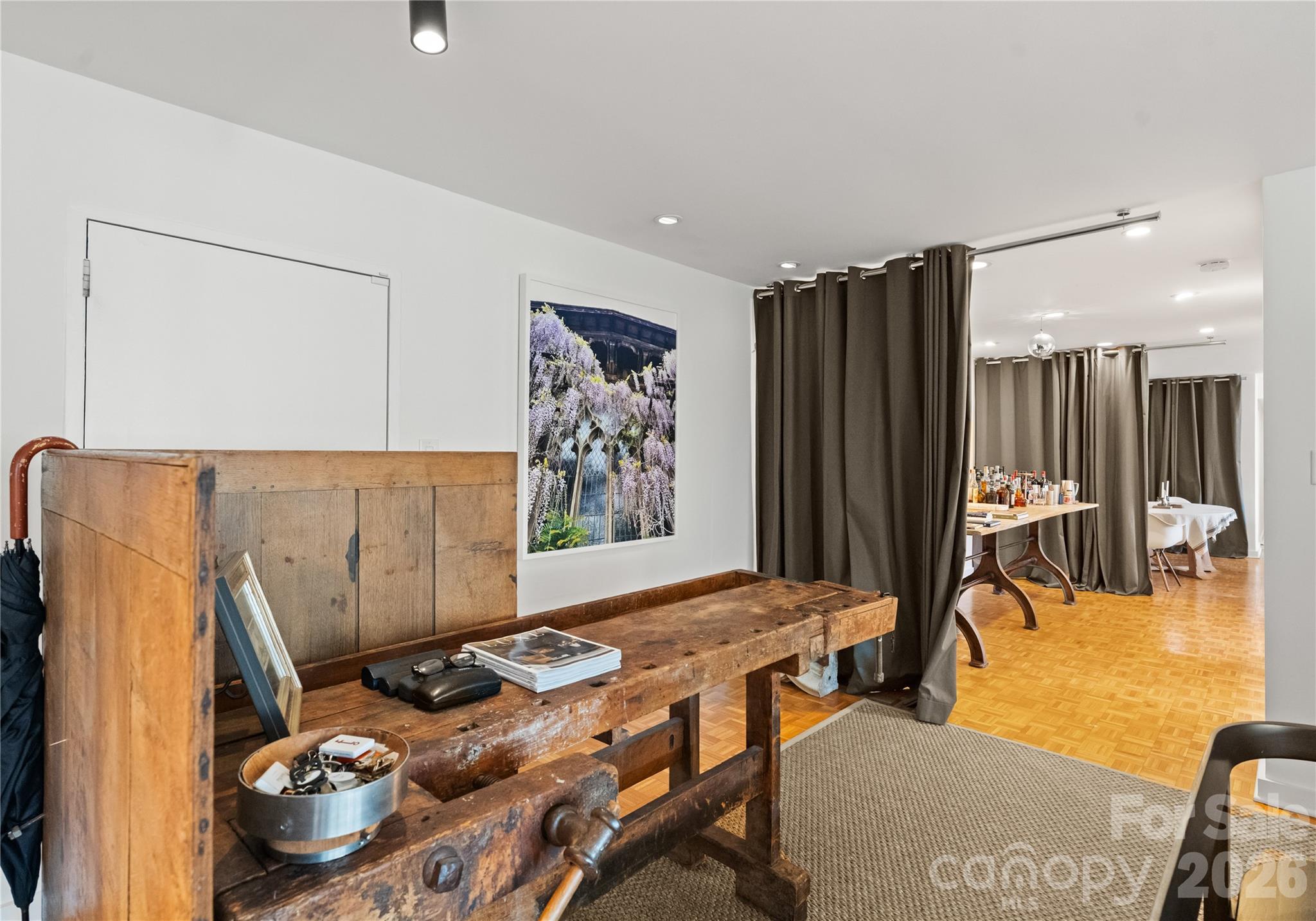 1300 Queens Road Charlotte, NC 28207 - Photo 3 of 45 a bedroom with furniture and a large window