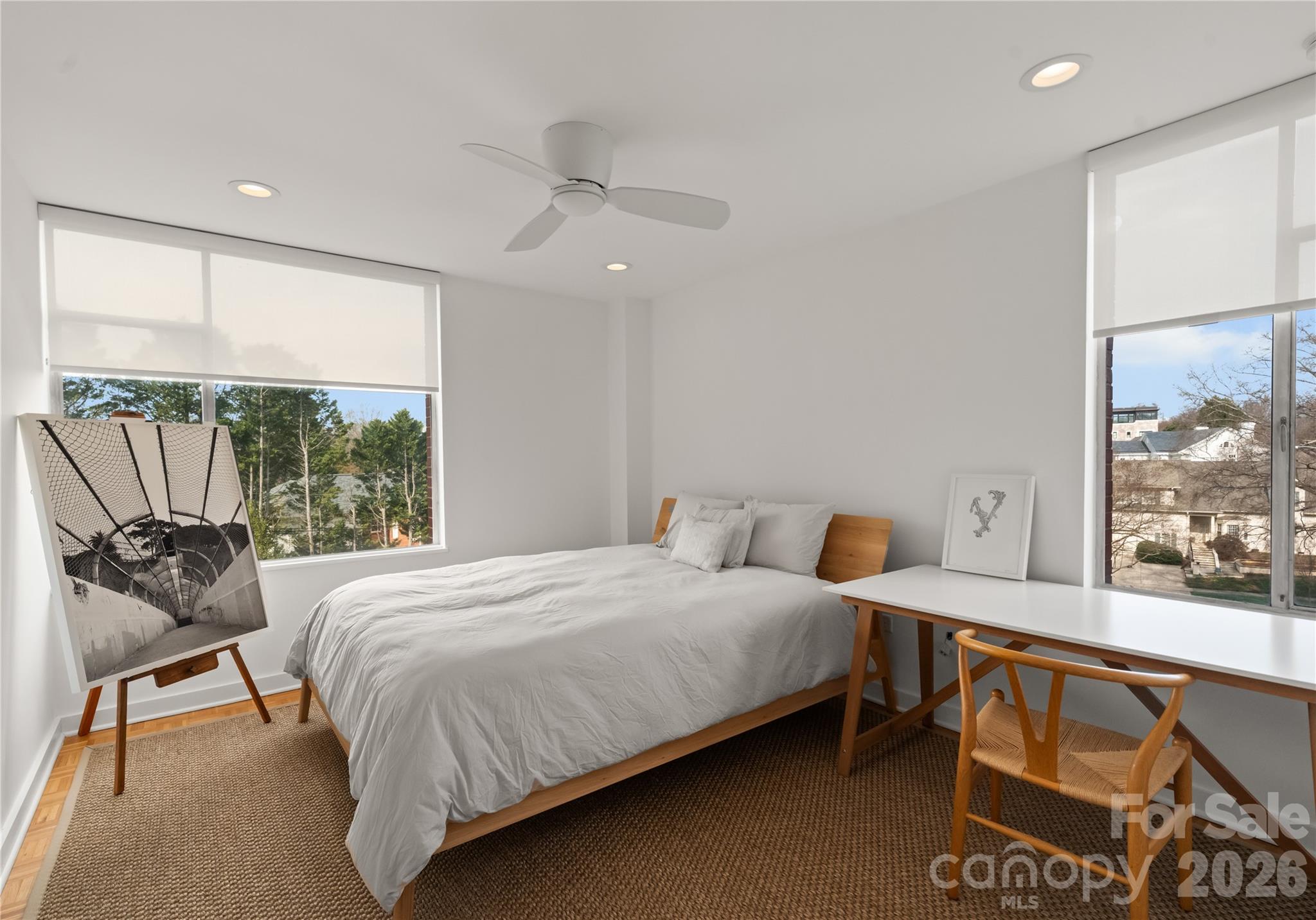 1300 Queens Road Charlotte, NC 28207 - Photo 32 of 45 a bedroom with a bed and a window