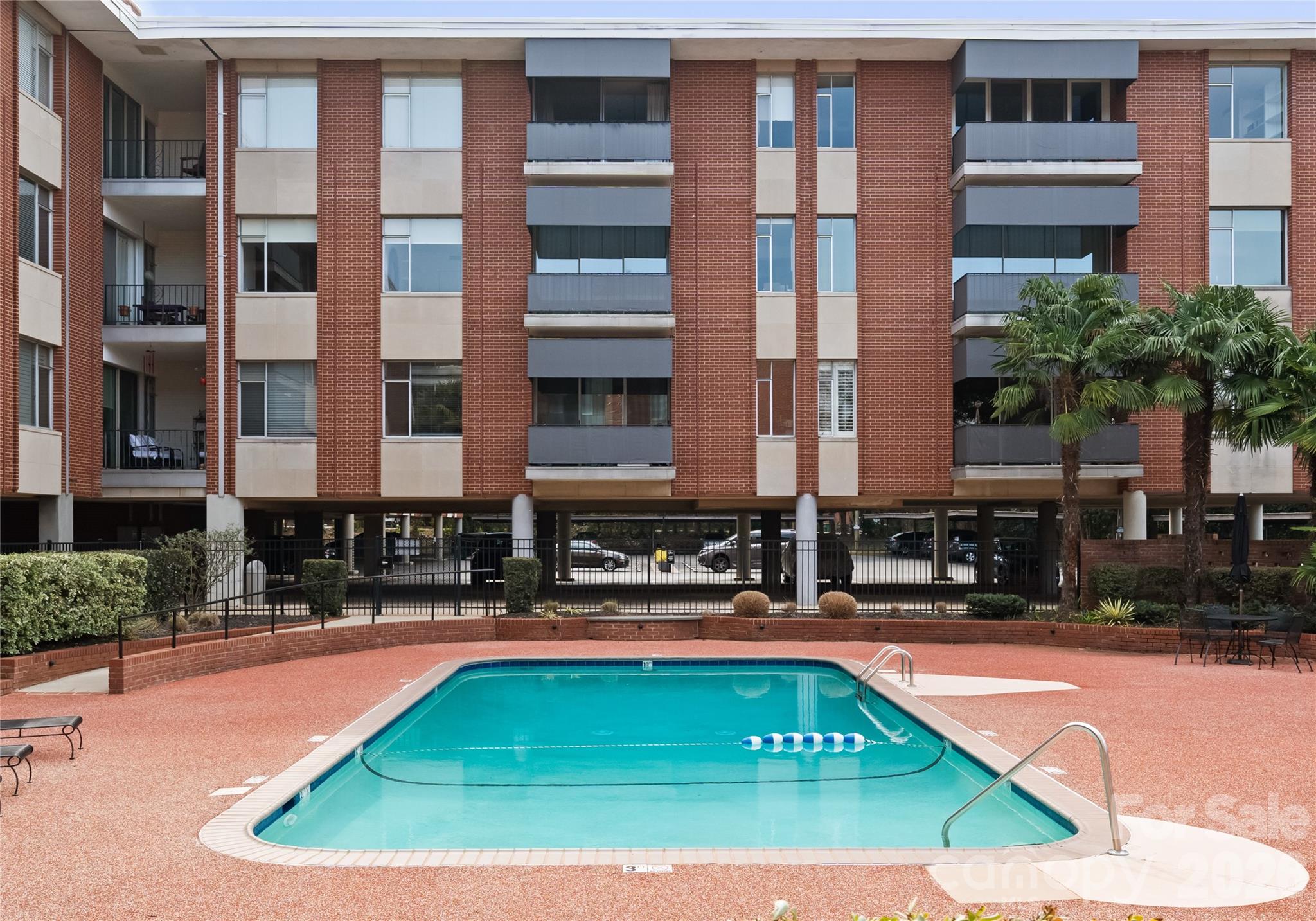 1300 Queens Road Charlotte, NC 28207 - Photo 41 of 45 a view of pool with outdoor seating
