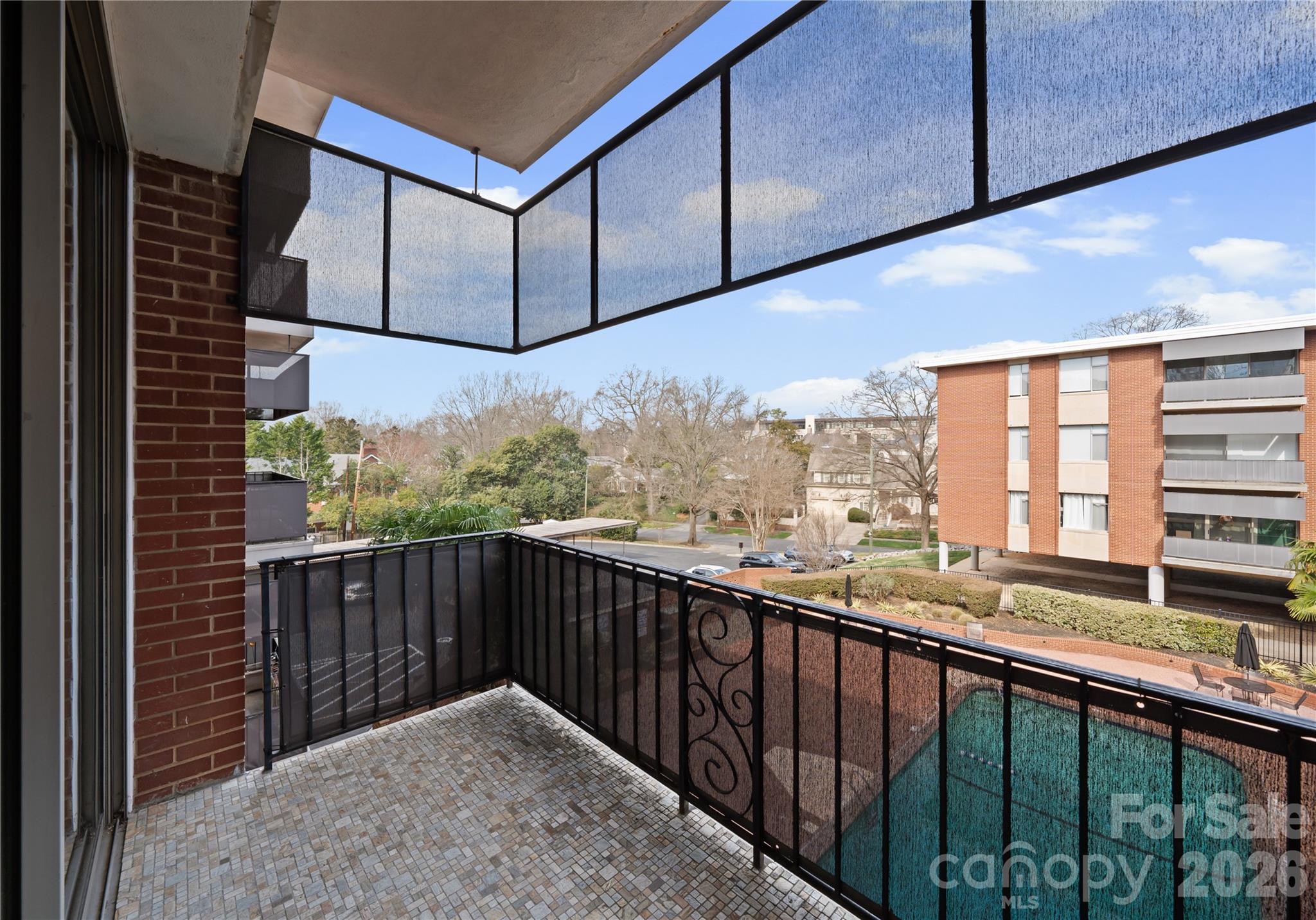 1300 Queens Road Charlotte, NC 28207 - Photo 43 of 45 a balcony view with city skyline