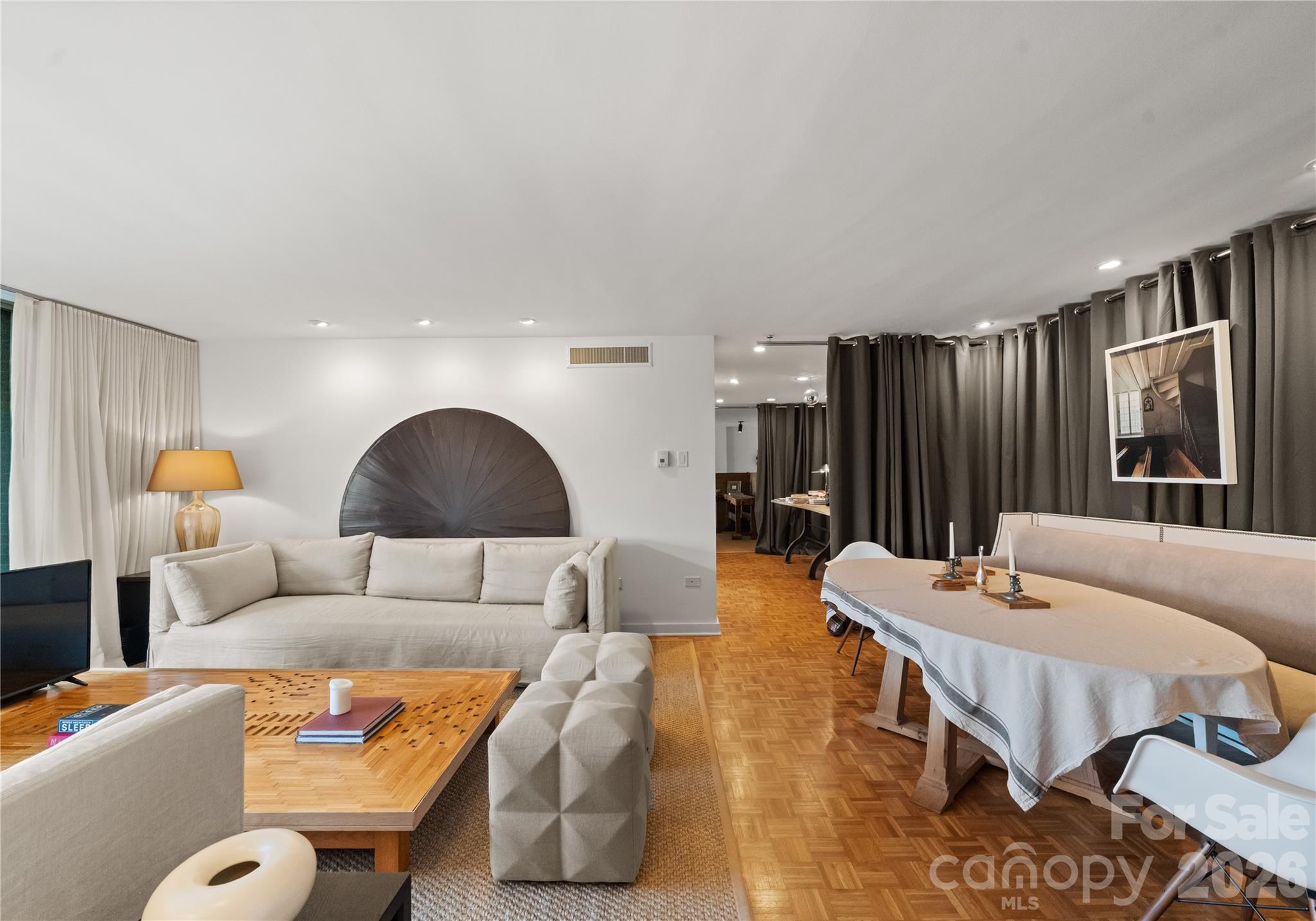 1300 Queens Road Charlotte, NC 28207 - Photo 5 of 45 a living room with furniture and a lamp