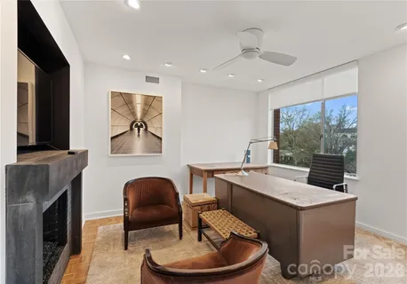 a view of kitchen with furniture and fireplace
