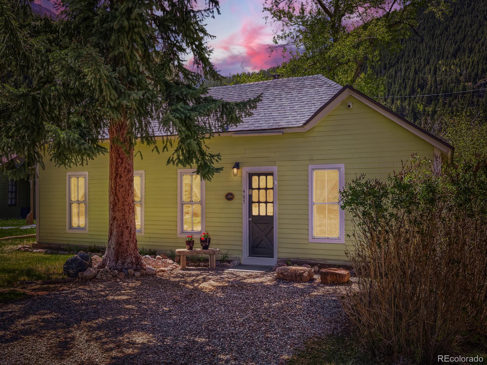 407 Seventh Street Georgetown, CO 80444 - Photo 1 of 28 a front view of a house with a yard