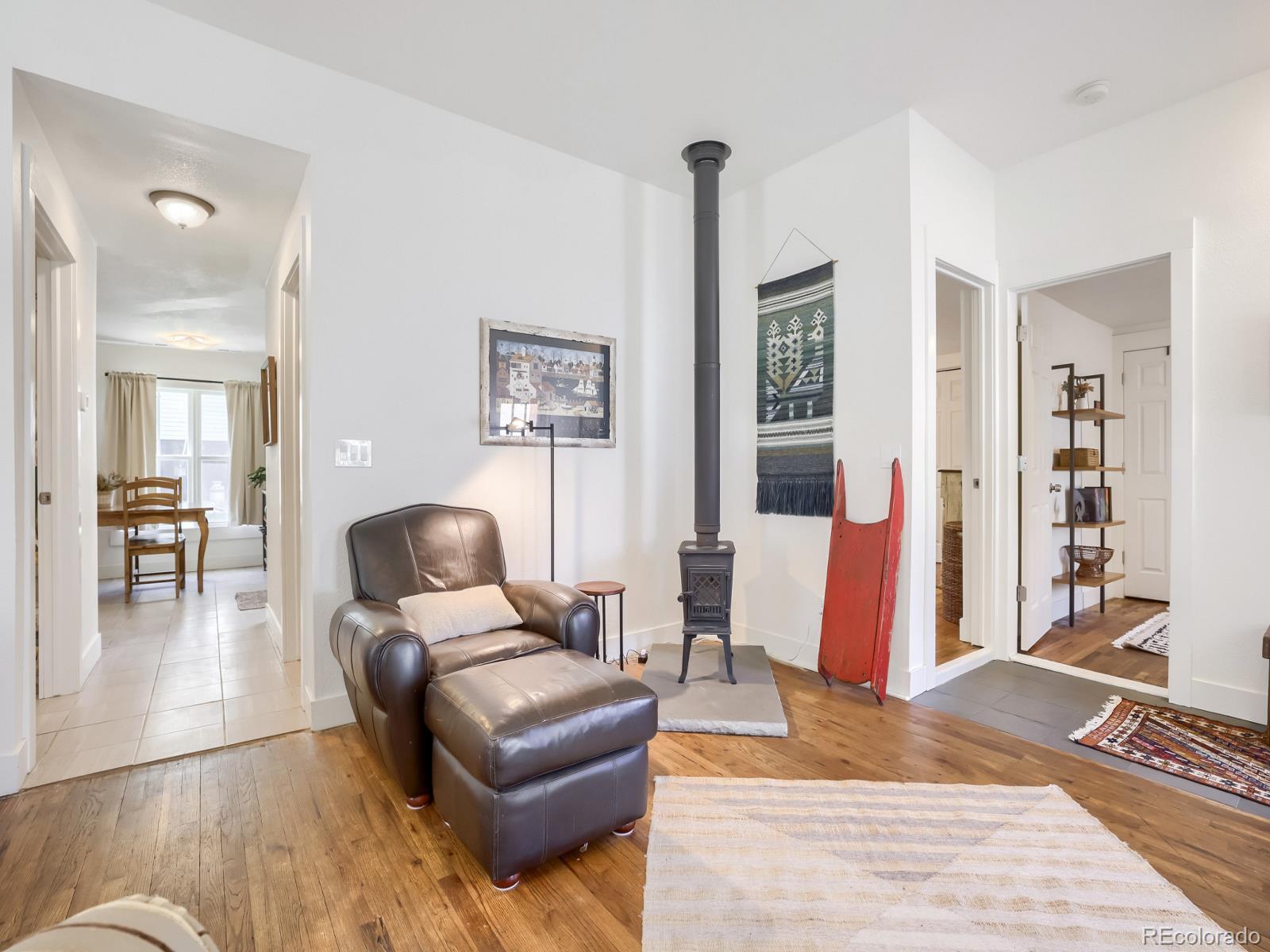 407 Seventh Street Georgetown, CO 80444 - Photo 12 of 28 a living room with furniture and a wooden floor