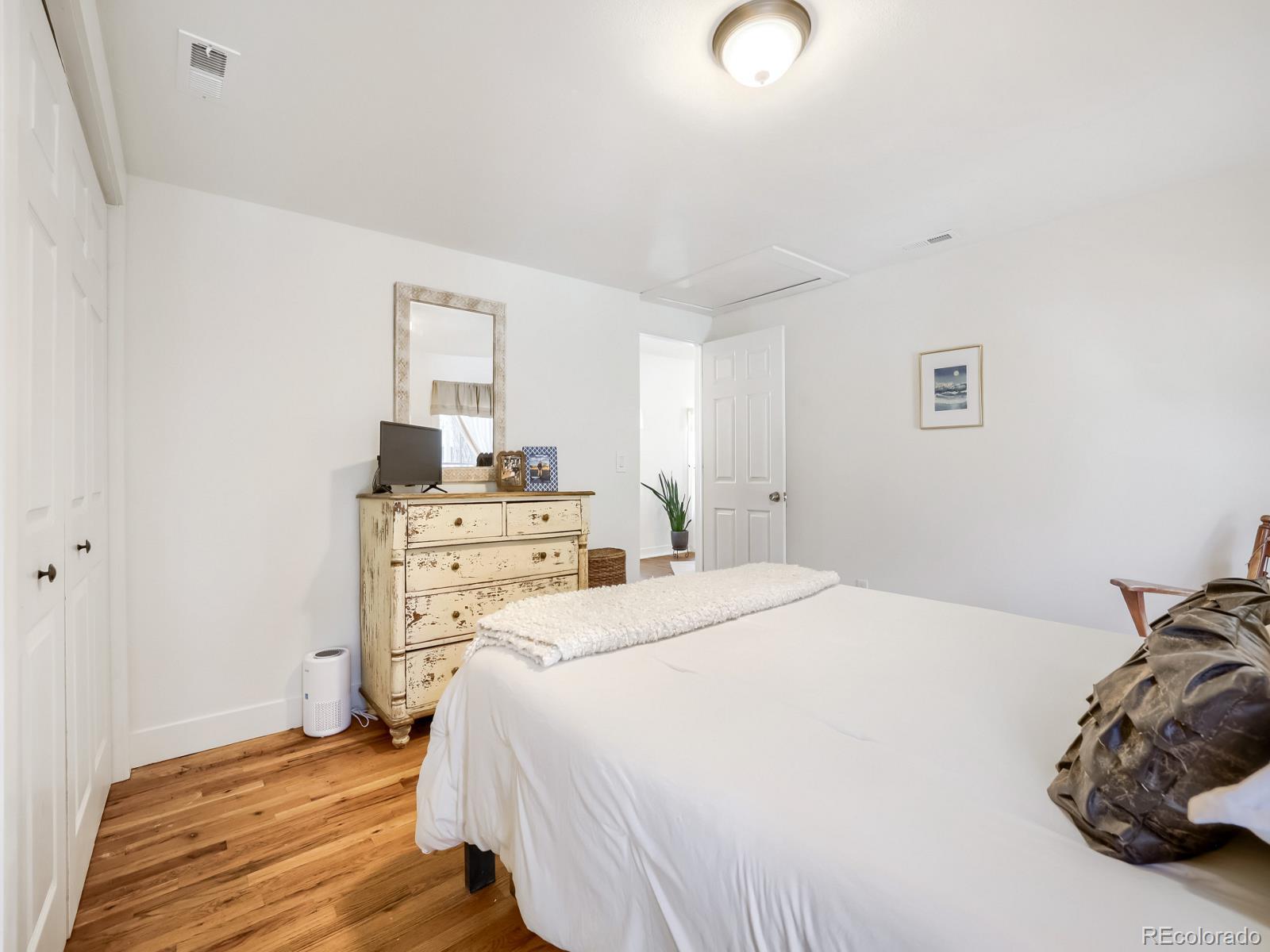 407 Seventh Street Georgetown, CO 80444 - Photo 14 of 28 a bedroom with a bed and a window